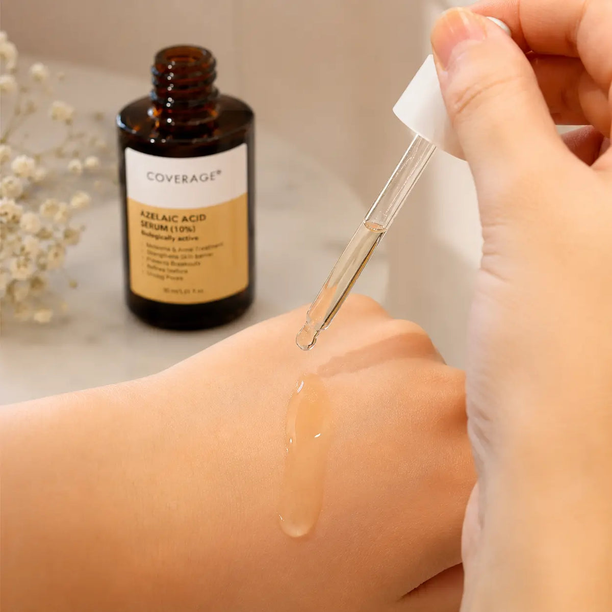 COVERAGE Azelaic Acid 10% Serum lightweight texture swatch for daily use on acne prone skin