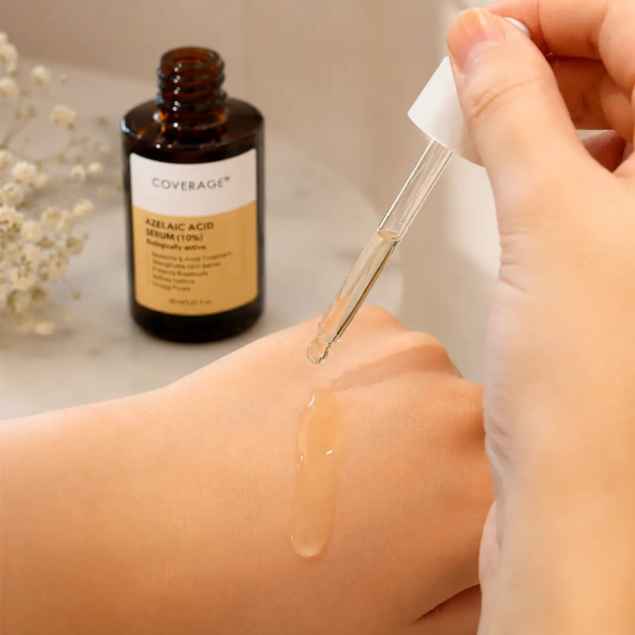 COVERAGE Azelaic Acid 10% Serum lightweight texture swatch for daily use on acne prone skin